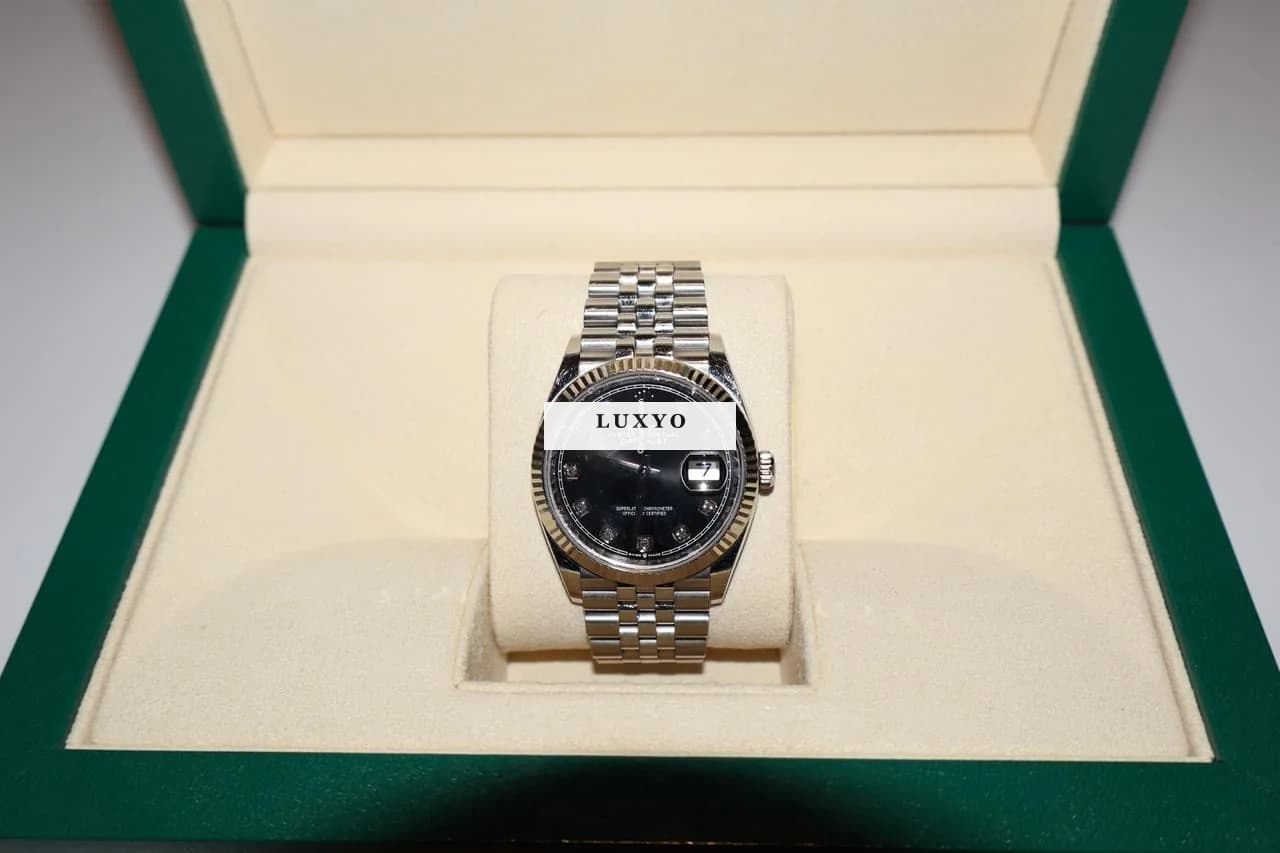 Rolex Datejust Oyster, 36 mm, Oystersteel and white gold, black dial - Image 1